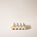 A step shaped concrete soap dish